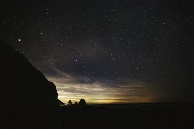 Mountains, sea and stars darkness and light