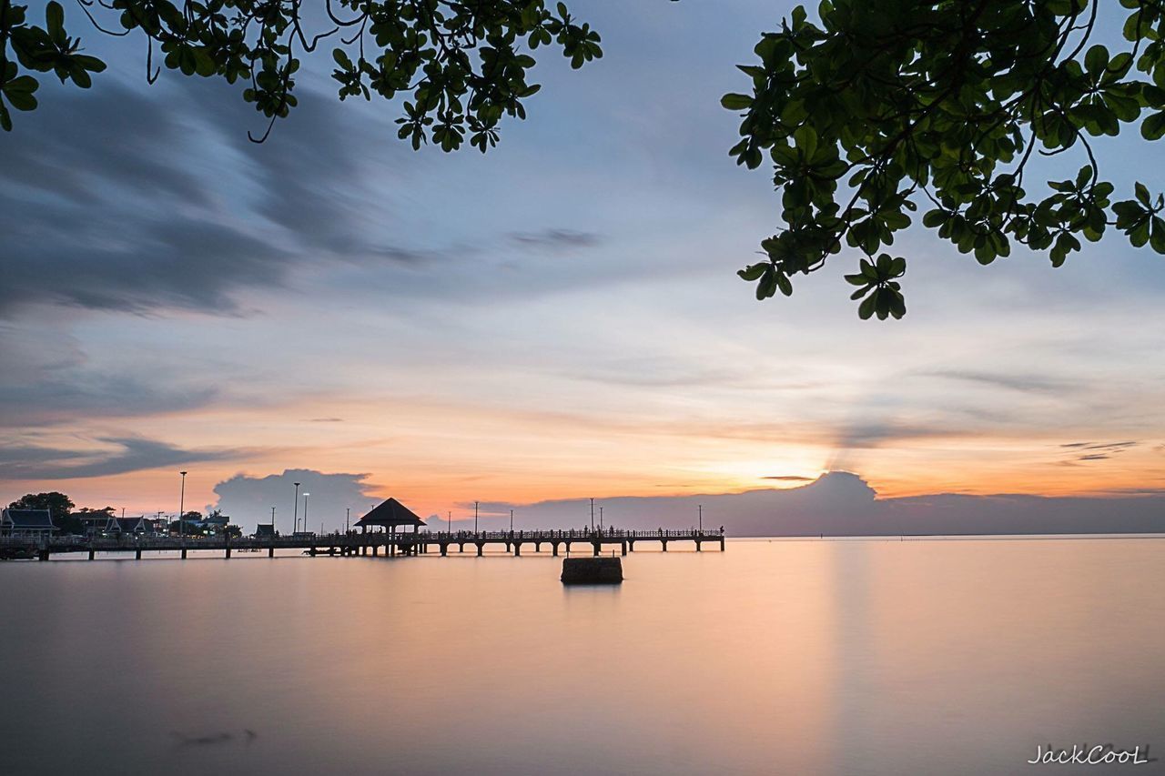 SCENIC VIEW OF SUNSET OVER SEA