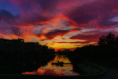 Dramatic sky over city during sunset