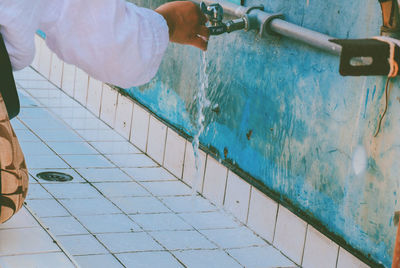 Man working in swimming pool