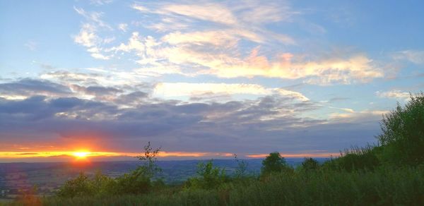 Scenic view of sunset over landscape