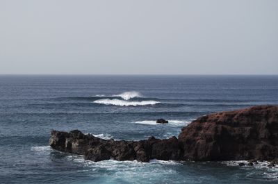 Scenic view of sea against clear sky