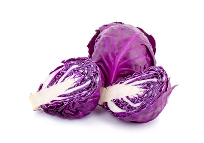 Close-up of purple roses against white background