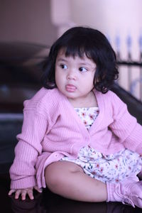 Portrait of a girl looking away