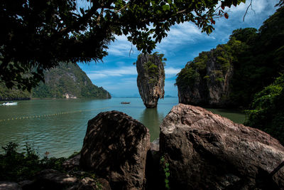 Scenic view of calm sea against blue sky