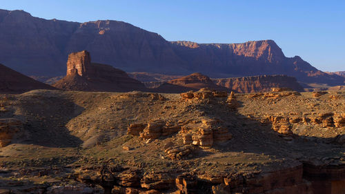 Aerial view of landscape with mountain range in background