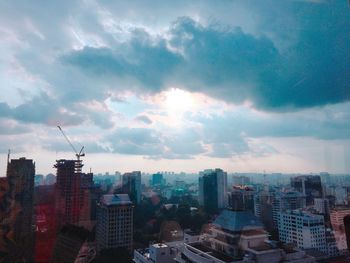 Modern buildings in city against sky