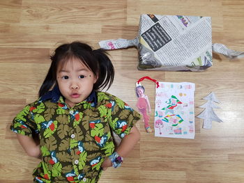 Portrait of cute girl on table