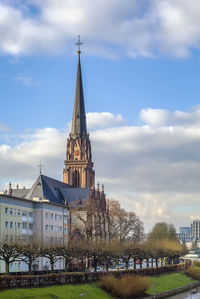 View of temple building against cloudy sky