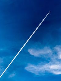 Low angle view of vapor trail in sky