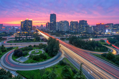 High angle view of light trails on road at night