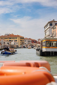 Boats in sea against sky
