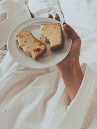 High angle view of woman holding food