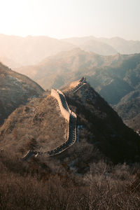 Scenic view of mountains against sky during sunset