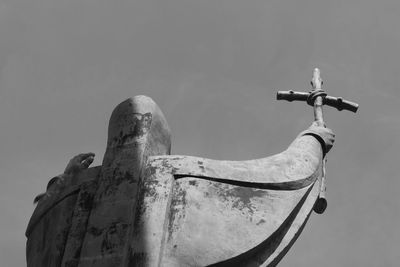 Low angle view of old boat against clear sky