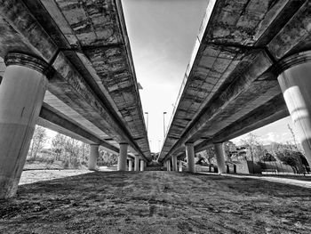 Low angle view of bridges against sky