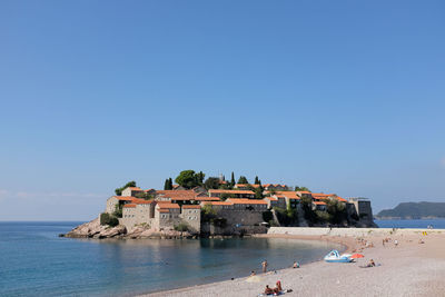 Sveti stefan island with beach, sea and sky