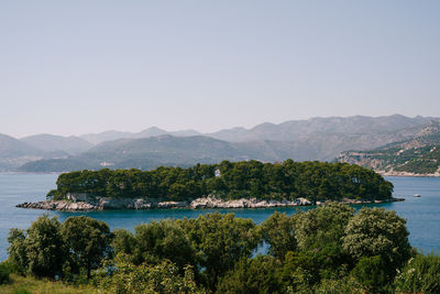 Scenic view of sea against clear sky