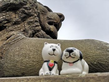 Low angle view of statue against sky