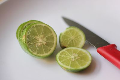 High angle view of lemon slice on white background