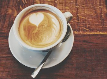 High angle view of cappuccino on table