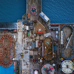 High angle view of amusement park in the pier