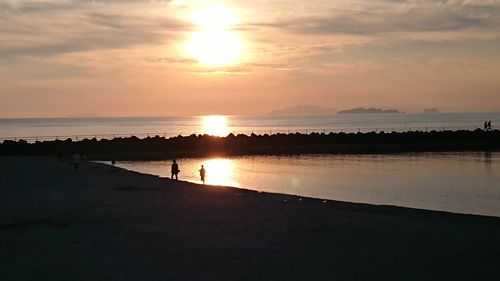 Scenic view of sunset over sea