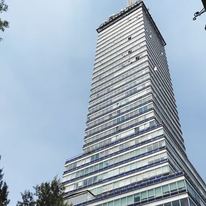 Low angle view of skyscrapers against sky