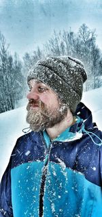 Portrait of man in snow
