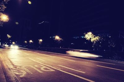 Light trails on road at night