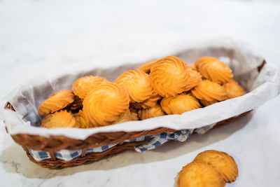 High angle view of orange on table against white background