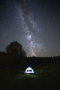 Tent against sky at night