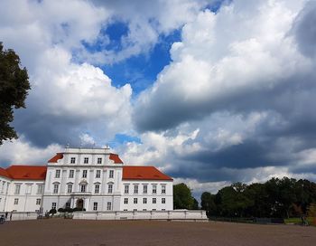 Building against cloudy sky