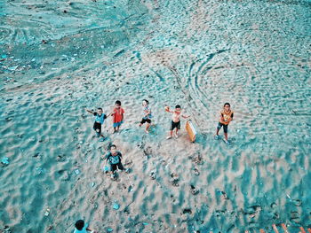 High angle view of people swimming in pool