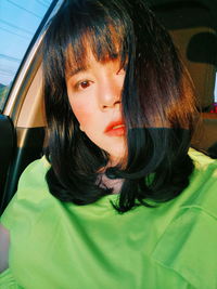 Portrait of woman in car
