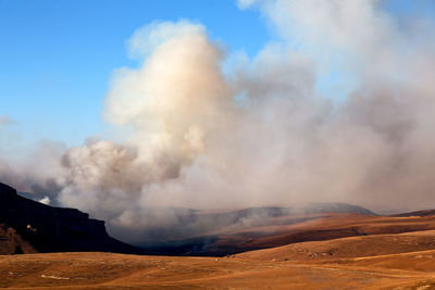 Panoramic view of volcanic landscape against sky