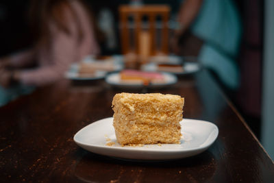 Close-up of cake served in plate on table