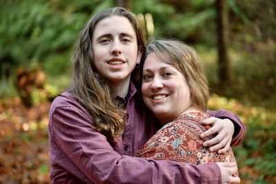 Portrait of a smiling son and mother 