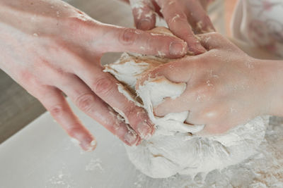 Close-up of hand holding ice cream