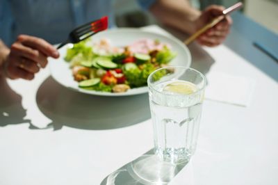 Close-up of hand holding drink