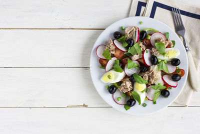 High angle view of salad in bowl on table