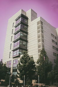 Low angle view of skyscrapers against clear sky