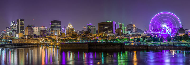 Illuminated city lit up at night