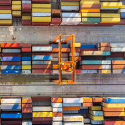 Aerial view of shipping container port terminal. colourful pattern of containers in harbor. maritime