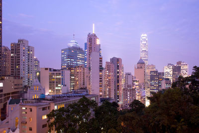 Modern buildings in city against sky