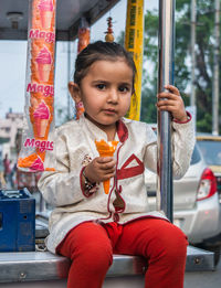 Portrait of cute girl in amusement park