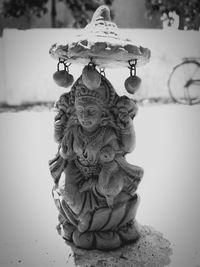 Close-up of statue against sky