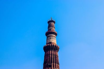 Low angle view of building against blue sky