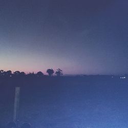 Scenic view of landscape against blue sky