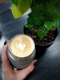 High angle view of coffee cup on table
